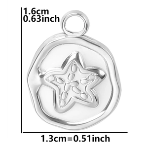 Macro shot of a silver starfish pendant showing 1.6cm height and 1.3cm width dimensions