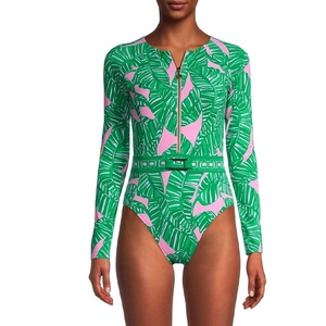 Close-up of long sleeve tropical print swimsuit with front zipper and matching waist belt