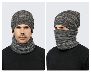 Detail of grey knitted winter hat and neck warmer set showing texture and dual-wear style