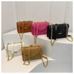 Chic quilted crossbody bags shown in five colors with elegant gold chain straps