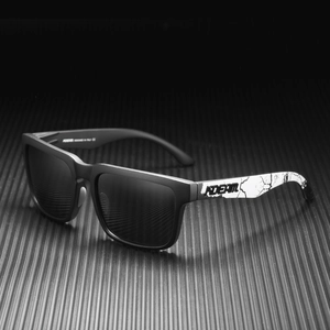 Close-up of black square polarized sunglasses with unique black and white crackle pattern