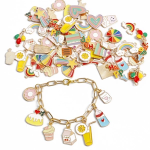 Colorful enamel alloy charms for DIY jewelry making with gold bracelet chain on white background