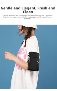 Detail of black crossbody phone pouch with heart-shaped metal zipper and multi-pocket