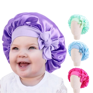 Kids satin hair bonnet with large bow and silky milk silk fabric in multiple colors