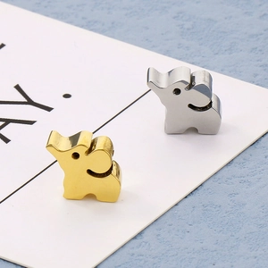 Golden and silver elephant-shaped metal charms for jewelry making and DIY projects