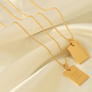 Golden titanium steel necklace with square pendants engraved Breathe and More Self Love