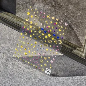 3D embossed nail stickers featuring metallic stars, moons and hearts with 5D texture