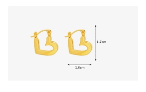 Macro view of gold heart shaped hoop earrings with 1.7cm height and 1.6cm width dimensions