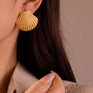 Elegant gold fan-shaped shell earrings in polished titanium steel for modern women