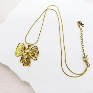 Elegant 18K gold butterfly bow pendant necklace with textured snake chain for women