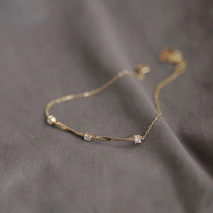 Minimalist Mobius S925 sterling silver 14K gold bracelet with sparkling diamonds