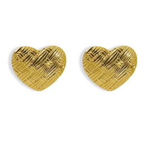 Detailed view of heart stud earrings with an intricate woven gold texture pattern