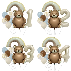 Detail of matte teddy bear, rainbow, and cream number balloon set for kids birthday party
