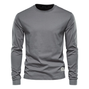 Detailed texture of gray long-sleeve cotton T-shirt showing fabric quality and neck label