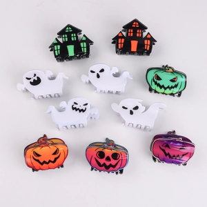 Set of 10 Halloween hair claws featuring ghosts, pumpkins, and haunted house designs