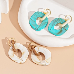 Minimalist geometric acrylic hoop earrings with marble pattern and gold metal accents