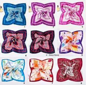 Detailed grid of satin square scarves featuring leopard print and geometric patterns