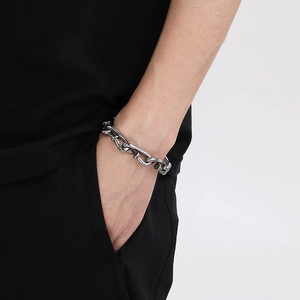 Close-up of vintage industrial style square linked black titanium steel bracelet for men