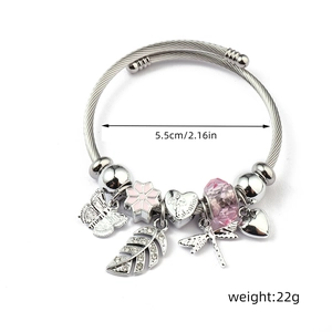 Silver charm wire bracelet with pink enamel flower, butterfly, and Valentine heart charms