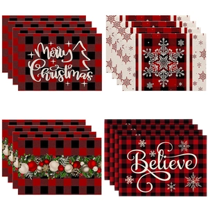 Set of 4 Christmas placemats with red black plaid pattern and festive snowman motifs