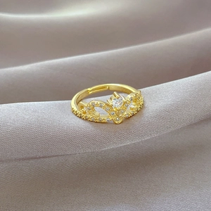 Hollow crown adjustable ring in gold finish with sparkling zircon stones
