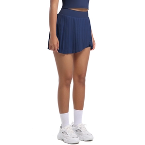 Detail view of navy blue pleated tennis skirt with high waist and side pockets