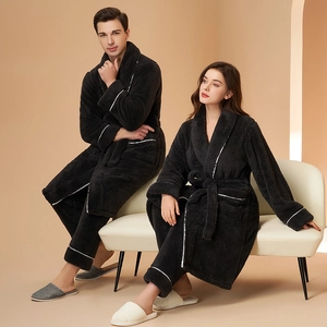 Matching black flannel pajama set for couples with white piping for autumn and winter