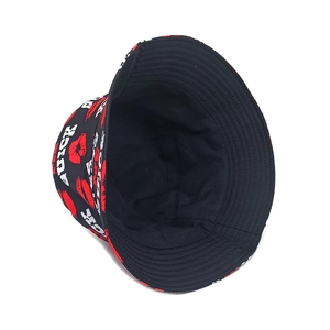 Fashionable bucket hat with red lips and QUICK lettering print for outdoor sun protection