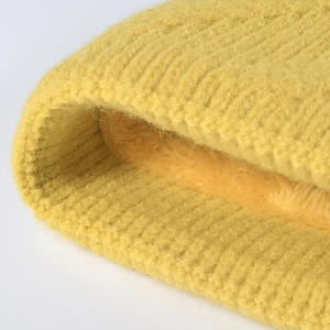 Yellow chunky knit beanie with thick thermal fleece lining for winter outdoor warmth