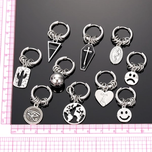 Set of 10 vintage stainless steel punk earrings featuring smiley face and cross charms