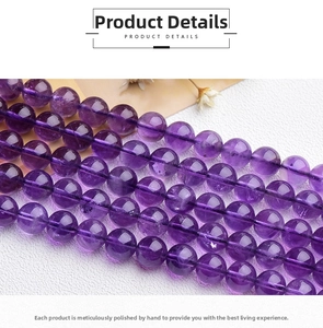 Macro detail of natural Uruguay amethyst round beads showing purple clarity and texture