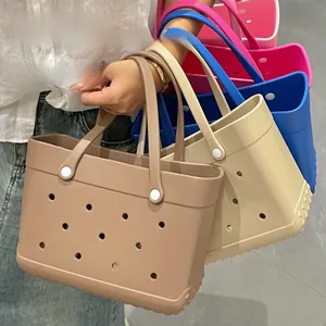 Detailed view of lightweight EVA beach tote bags with signature holes in four colors