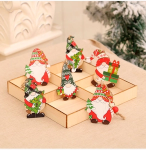 Detailed view of 6 colorful wooden Christmas gnome ornaments with hanging strings and festive art