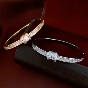 Luxury 18K gold plated oval buckle bracelet with full pavé crystals and bow design