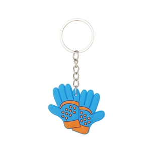 Close-up of blue and orange PVC football glove keychains for world cup party favors