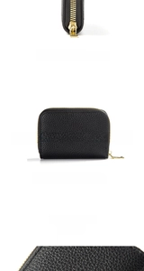 Close-up of black litchi grain leather texture and gold zipper on RFID card wallet