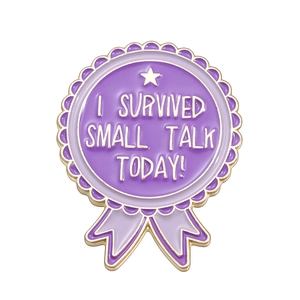 Purple and gold enamel medal pin with I Survived Small Talk Today humorous quote