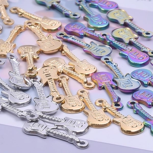 Minimalist guitar shaped stainless steel pendants in gold, silver, and rainbow finishes