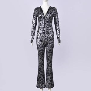 Detail view of silver leopard print jumpsuit with deep V-neck and front zipper closure
