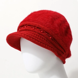 Women's dark red winter knit hat with plush faux fur and decorative bead details