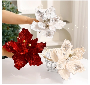 Detail of 20cm velvet Christmas flowers in red, white and champagne with glitter edges