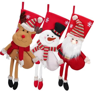 Three large Christmas stockings featuring 3D Santa, Snowman, and Reindeer plush designs