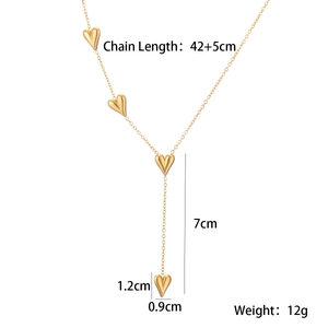 Detailed view of gold heart pendant necklace with dimension labels and measurements