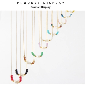Macro display of 18K gold plated necklaces with natural stones and baroque pearls