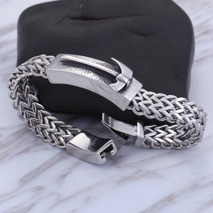 Men's silver 316L stainless steel bracelet with anchor charm on black rock