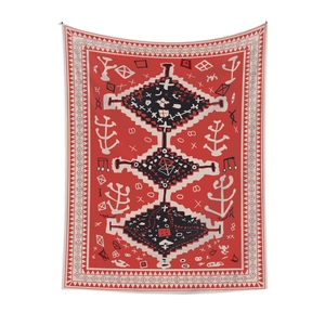 Bohemian tribal wall tapestry with red and black geometric patterns on white background