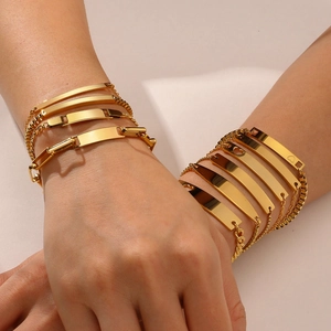 18K gold plated stainless steel curved bar adjustable bracelets on female hands