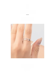 Detail of S925 sterling silver double-layered open ring with a polished minimalist finish
