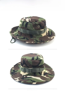 Detail view of woodland camouflage boonie hat showing metal eyelets and adjustable chin strap