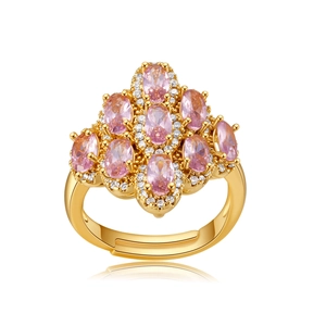 Detailed view of pink oval zircon stones set in a luxury gold bow-shaped ring